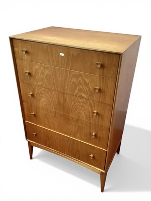 Lot 1529 - A Mid-Century Chest of Drawers, featuring...
