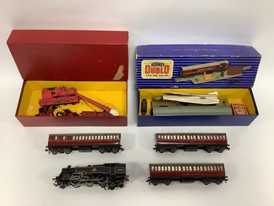 Lot 519 - Hornby Dublo 3 rail comprising of a 2-6-4 Tank,...