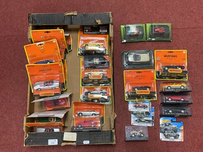 Lot 409 - Thirty diecast model vehicles by New-Ray,...