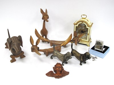 Lot 1430 - Wooden carved figures of a dog and foxes,...