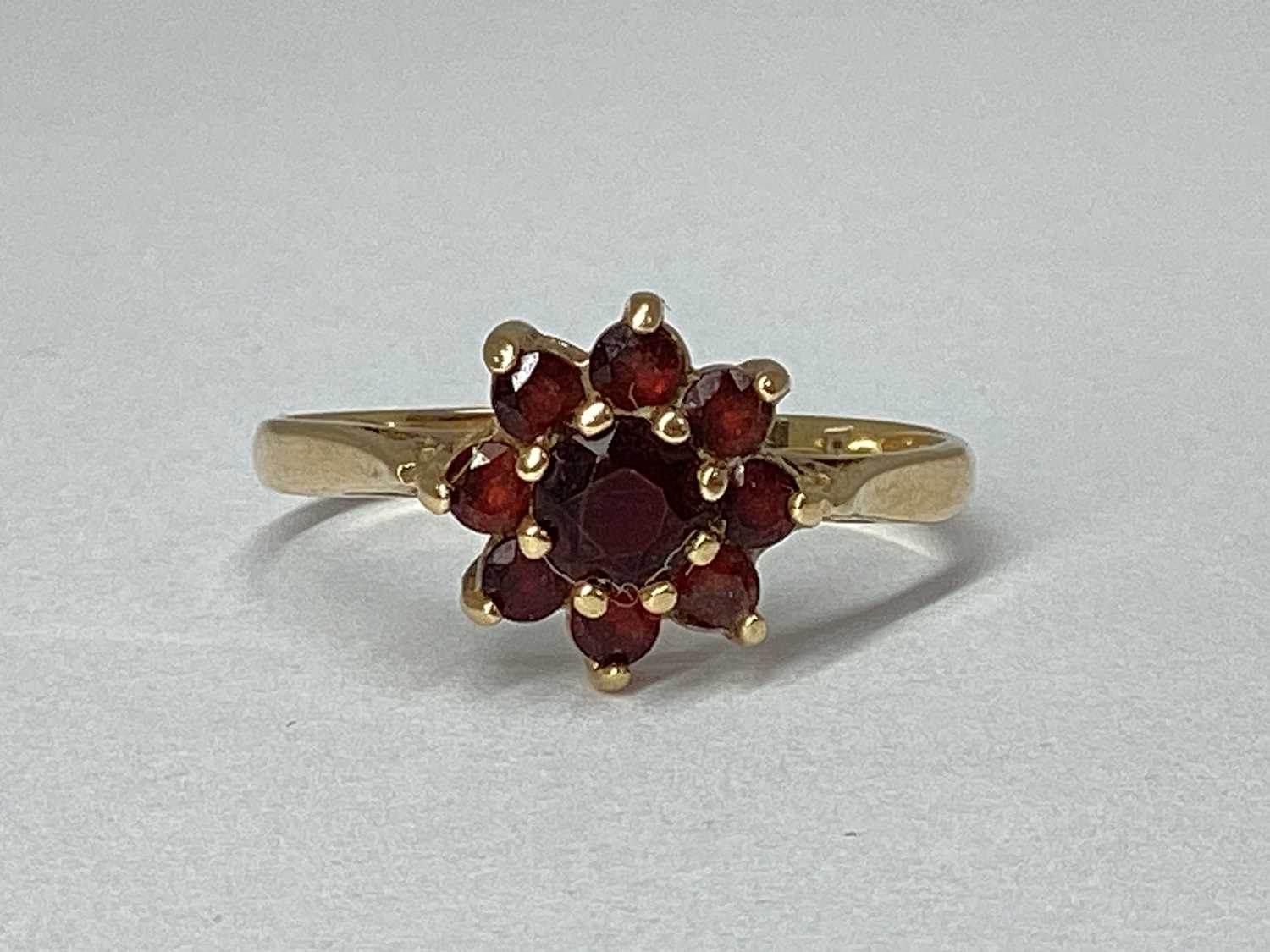 Lot 72 - A Flowerhead Style Cluster Ring, claw set...