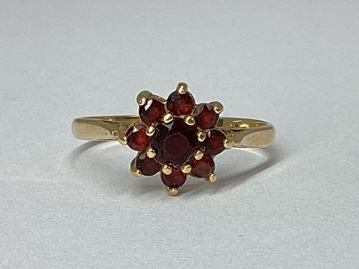 Lot 72 - A Flowerhead Style Cluster Ring, claw set...