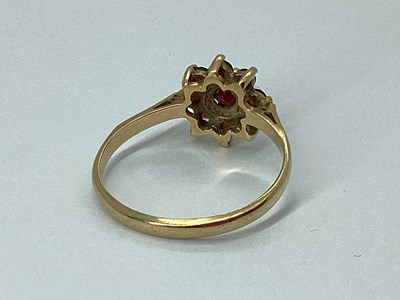 Lot 72 - A Flowerhead Style Cluster Ring, claw set...