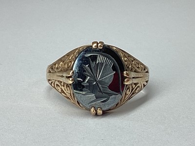Lot 70 - A 9ct Gold Carved Hematite Signet Style Ring,...