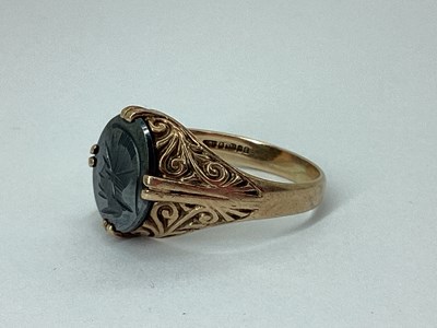 Lot 70 - A 9ct Gold Carved Hematite Signet Style Ring,...