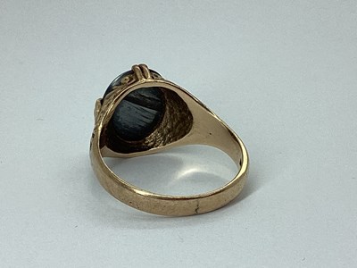 Lot 70 - A 9ct Gold Carved Hematite Signet Style Ring,...