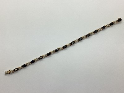 Lot 115 - A Decorative Claw Set Line Bracelet, of...