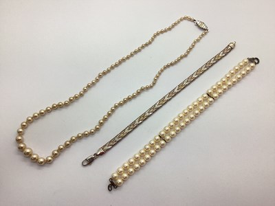 Lot 168 - A Modern Chevron Style Flat Link Bracelet, two...