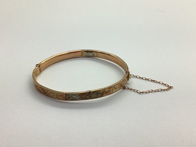 Lot 109 - A 9ct Rose Gold Bangle, semi textured...