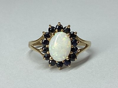 Lot 69 - A Modern 9ct Gold Cluster Ring, of flowerhead...