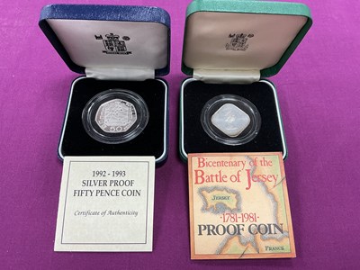 Lot 565 - Two Royal Mint Silver Proof Coins, includes a...