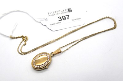 Lot 397 - A Modern 9ct Gold CZ Inset Oval Locket Pendant,...