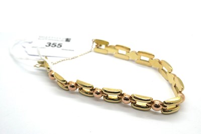 Lot 355 - A Geometric Link Bracelet, of two colour...