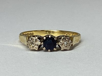 Lot 84 - An 18ct Gold Three Stone Ring, the centre...