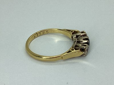 Lot 79 - An 18ct Gold Three Stone Ring, the centre...