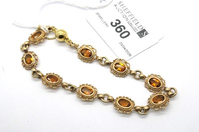 Lot 360 - A 9ct Gold Citrine Inset Bracelet, of uniform...
