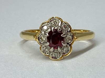 Lot 77 - An Oval Flowerhead Style Cluster Ring, the...