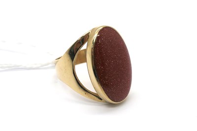 Lot 256 - A Modern 9ct Gold Goldstone Inset Oval Panel...