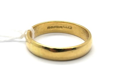 Lot 259 - An 18ct Gold Plain Wedding Band, (finger size T).