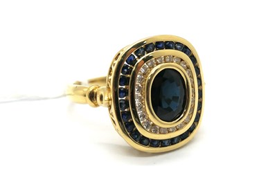 Lot 258 - A Modern Sapphire and Diamond Large Cluster...