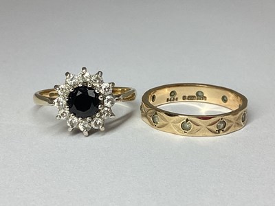 Lot 89 - A 9ct Gold Circular Flowerhead Style Cluster...