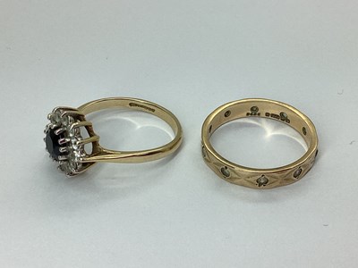 Lot 89 - A 9ct Gold Circular Flowerhead Style Cluster...