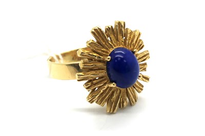 Lot 266 - A Lapis Lazuli Single Stone Dress Ring, oval...