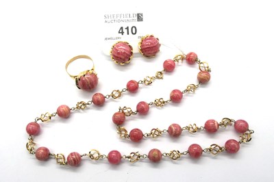 Lot 410 - A Rhodochrosite Polished Bead Necklace, the...