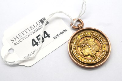Lot 454 - A 9ct Rose Gold Medallion Pendant, "Altrincham...