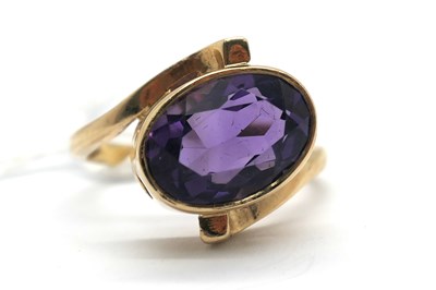 Lot 274 - A 9ct Gold Single Stone Dress Ring, oval...