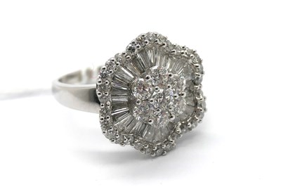 Lot 277 - A Modern Diamond Cluster Ring, of shaped...