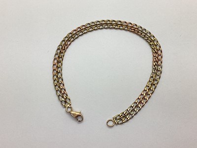Lot 111 - A Double Tri-Colour Flat Curb Link Bracelet,...