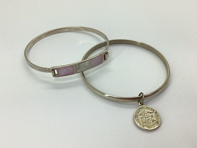 Lot 107 - A Modern Mother of Pearl Inset Bangle, with...