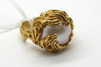 Lot 288 - A Mabé Pearl Dress Ring, within textured...