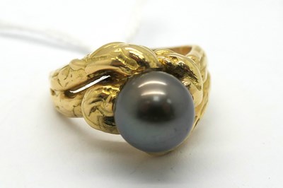 Lot 298 - A Dark Grey Single Pearl Dress Ring, high set...