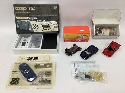 Lot 592 - Four 1:32 scale slot car kits by Vanquish MG,...