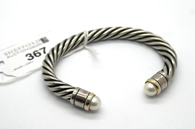 Lot 367 - A Modern Twisted Torque Bangle, stamped "925",...