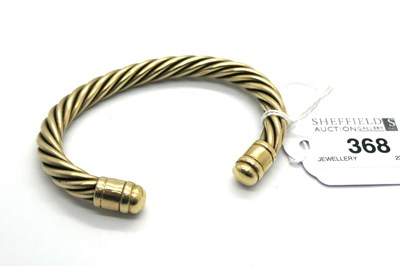 Lot 368 - A Modern Twisted Torque Bangle, gilt, stamped "...