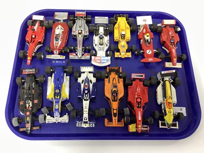 Lot 701 - Thirteen 1:32 scale slot cars. All with a...