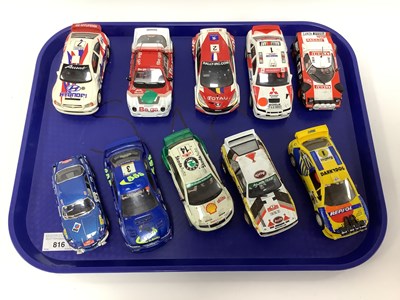 Lot 816 - Ten 1:32 scale slot cars. All with a rally...