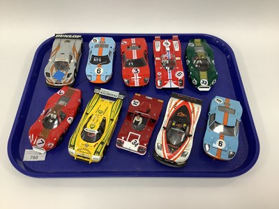 Lot 766 - Ten 1:32 scale slot cars. All with a Le Mans...