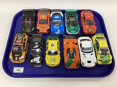 Lot 730 - Eleven 1:32 scale slot cars. Mostly with a...