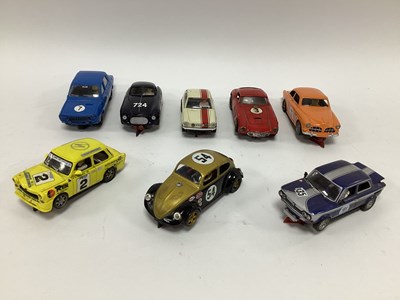 Lot 725 - Eight 1:32 scale slot cars. All racing...