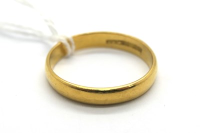 Lot 313 - A 22ct Gold Plain Wedding Band, (finger size...