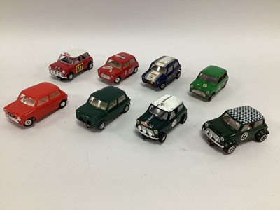 Lot 729 - Eight 1:32 scale slot cars. All Mini variants....