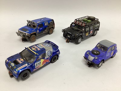 Lot 707 - Four 1:32 scale slot cars. Mostly with an...
