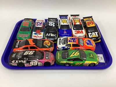 Lot 720 - Ten 1:32 scale slot cars. All with a NASCAR...