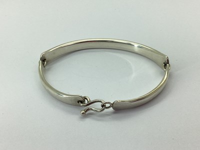 Lot 124 - A Modern Panel Design Bracelet, the solid...