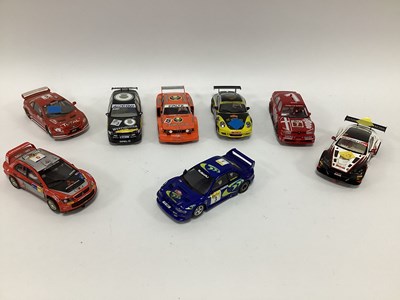 Lot 718 - Eight 1:32 scale slot cars. Mostly with a...