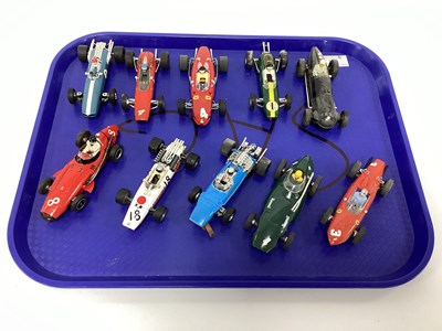 Lot 731 - Ten 1:32 scale slot cars. Mostly with a...